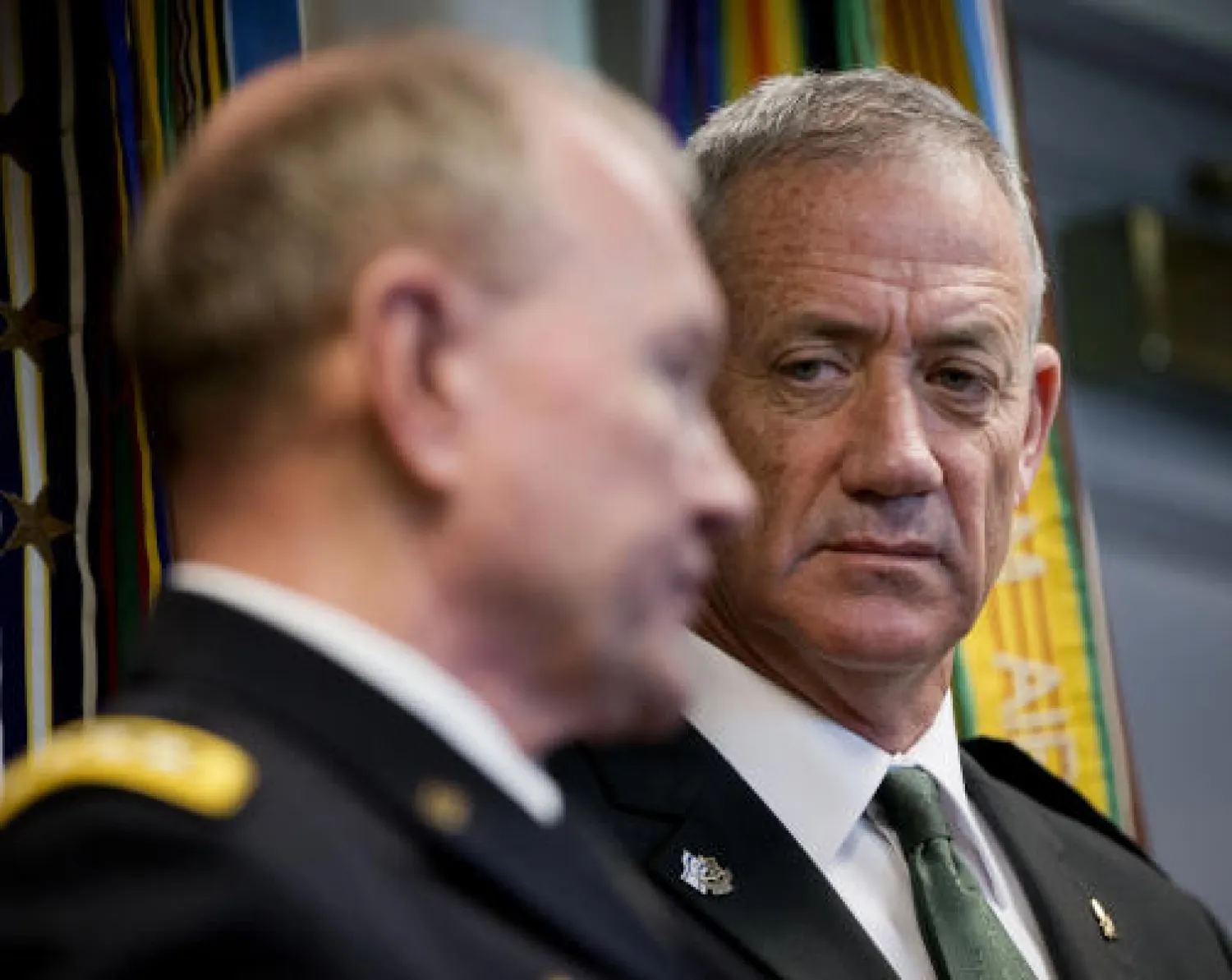 In this Jan. 8, 2015 file photo, then Israeli Defense Minister Benny Gantz, right, listens as then Joint Chiefs Chairman Gen. Martin E. Dempsey answers a question during a press conference at the Pentagon. On Thursday, Dec. 27, 2018