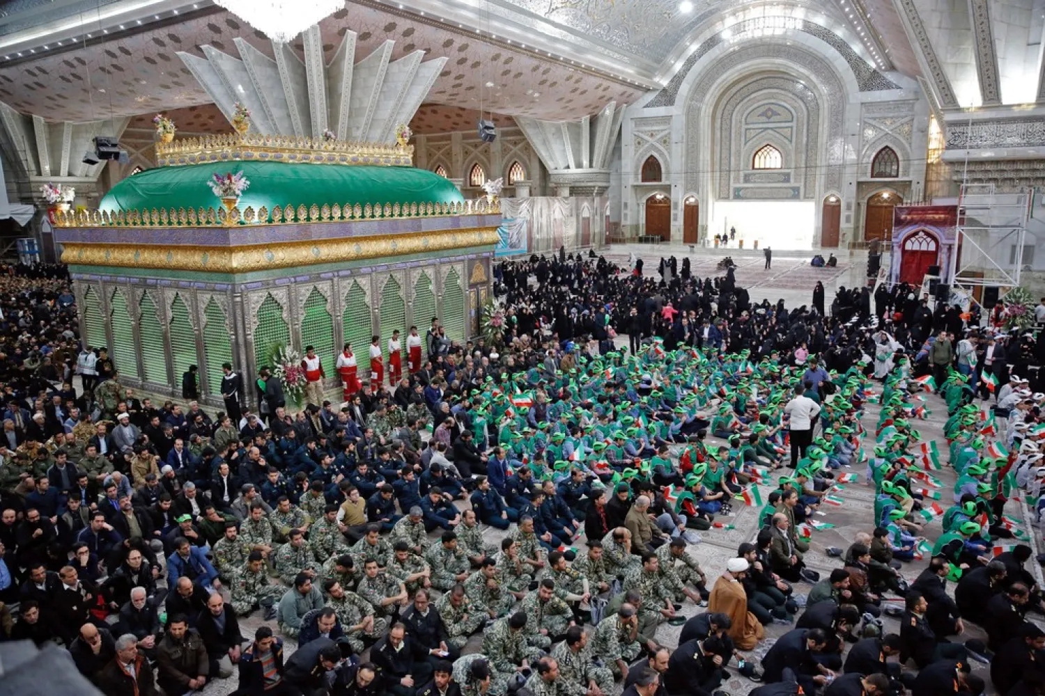 Pilgrims visit the tomb of the late founder of Iran's Islamic Republic, Ayatollah Ruhollah Khomeini, on the 40th anniversary of his return from exile at his mausoleum in southern Tehran