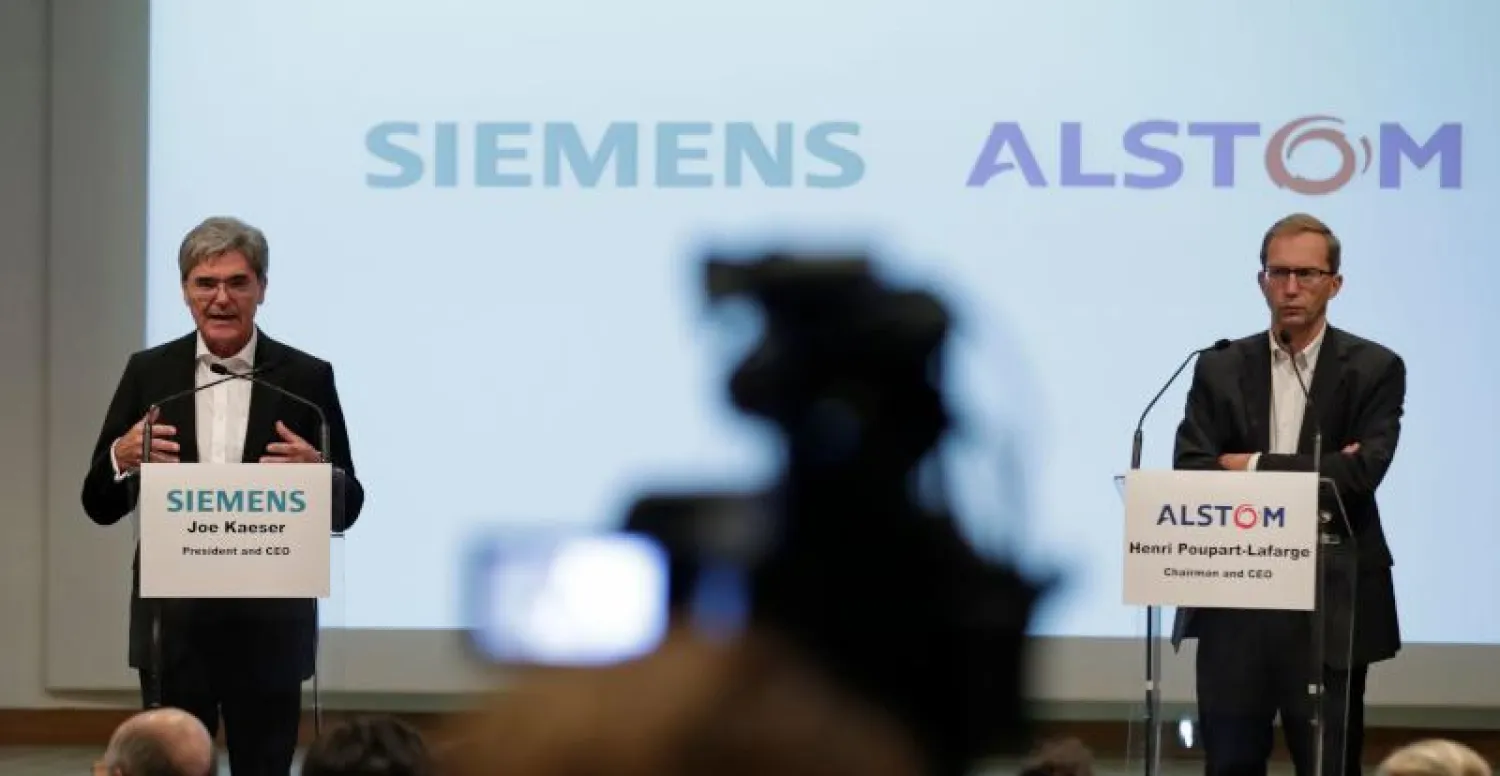 رئيس «سيمنز» والمدير التنفيذي لشركة «ألستوم» (أ.ف.ب)