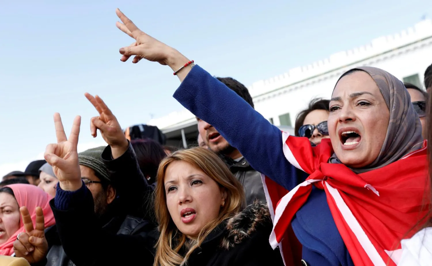 Tunisian teachers rally to demand better work conditions and higher wages, near the prime minister's office in Tunis (Reuters)