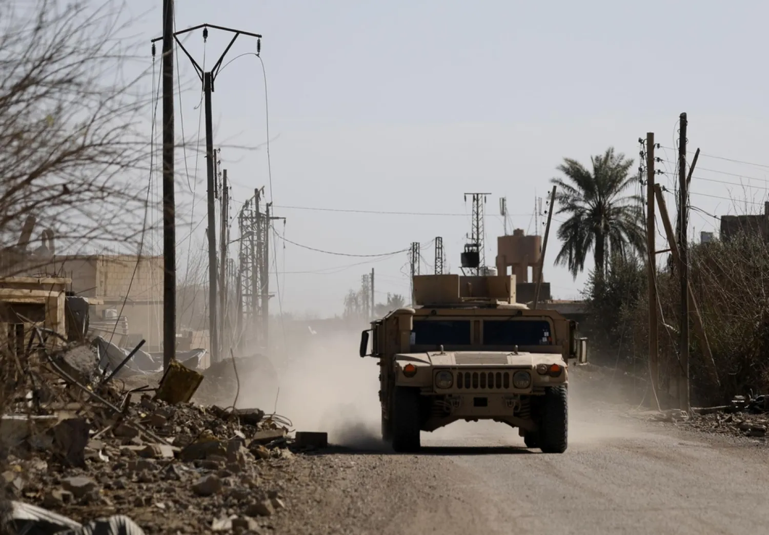 An armored vehicle belonging to the US-backed Syrian Democratic Forces (SDF) near the front line village of Baghouz in eastern Syria on February 2, 2019 | AFP