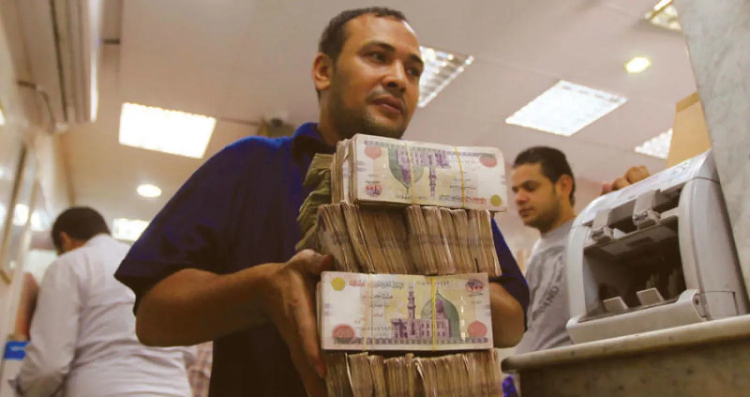 قالت الحكومة المصرية أمس إن تدفقات النقد الأجنبي تجاوزت 163 مليار دولار في السنوات الثلاث الماضية (رويترز)