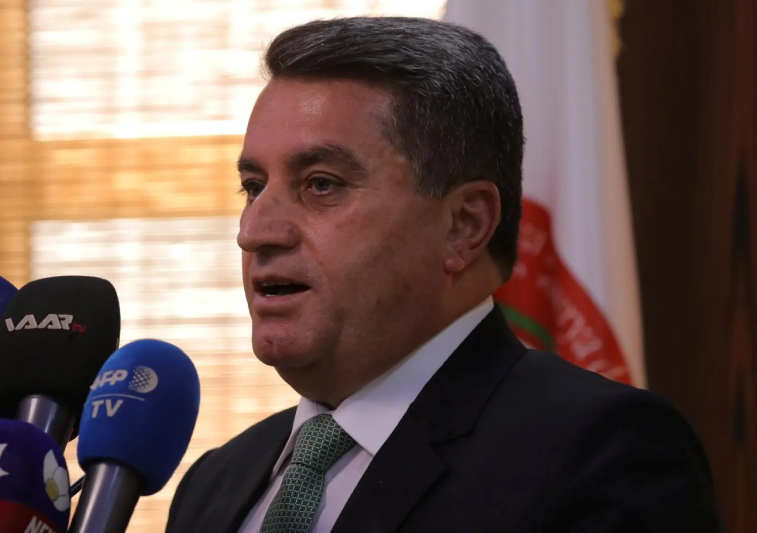 Abdulkarim Omar, head of the foreign relations commission speaks during a news conference in Qamishli, Syria September 20, 2018. REUTERS/Rodi Said