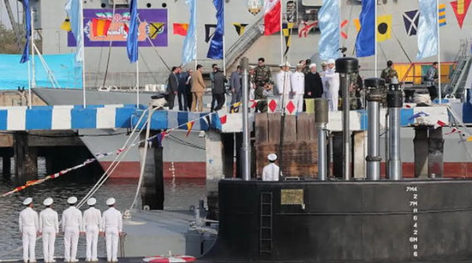 Cumhurbaşkanı Hasan Ruhani, Bender Abbas şehrinde seyir füzeleriyle donatılan Fatih denizaltısının açılışında (EPA)