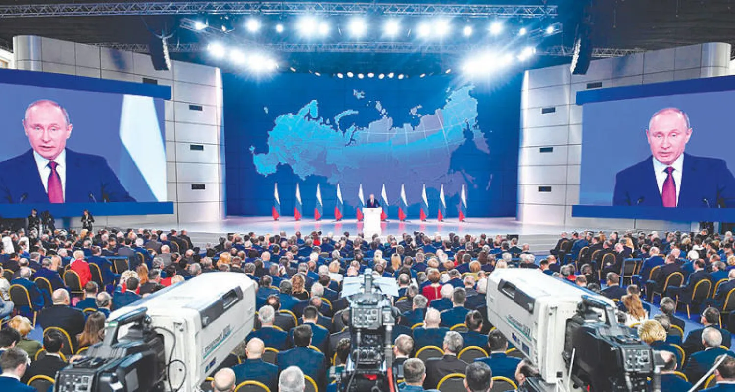 بوتين لدى إلقاء خطابه السنوي في موسكو أمس (أ.ف.ب)