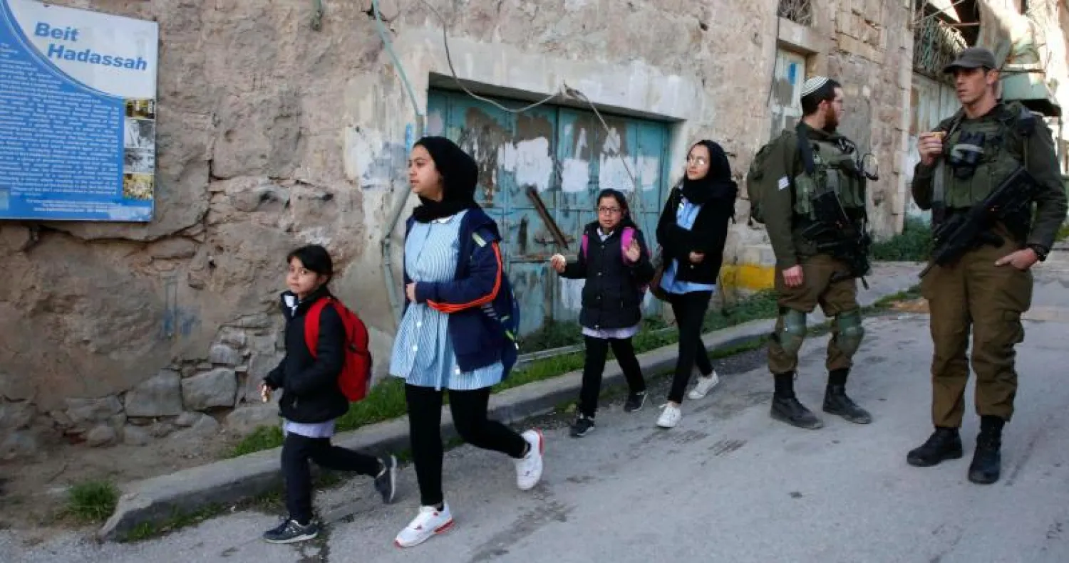 تلاميذ فلسطينيون في الخليل (أرشيف - رويترز)