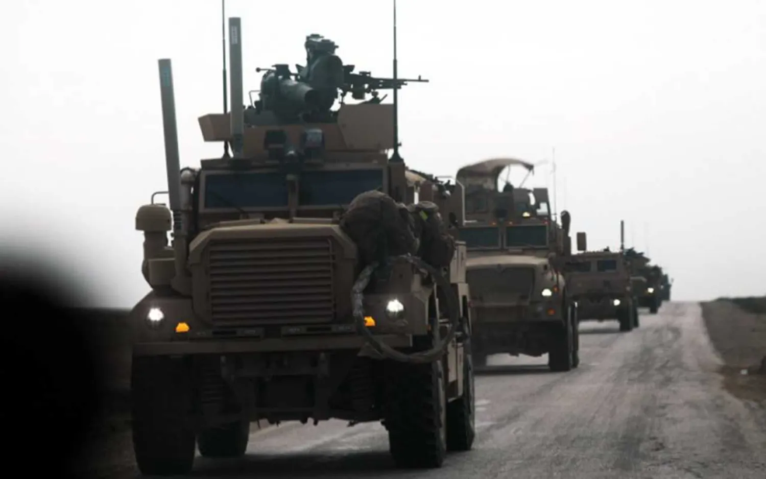Military vehicles with the US-backed coalition against ISIS during an operation to expel the militants, in the countryside of the eastern Syrian province of Deir Ezzor, February 21, 2019. (Delil Souleiman/AFP)