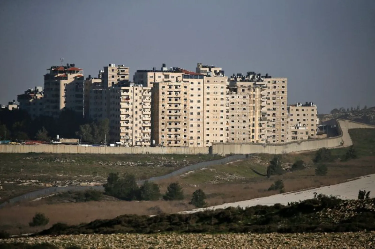 Israel considers Kufr Aqab part of Jerusalem, but the area lies on the other side of Israel's separation barrier dividing the city from the occupied West Bank | AFP