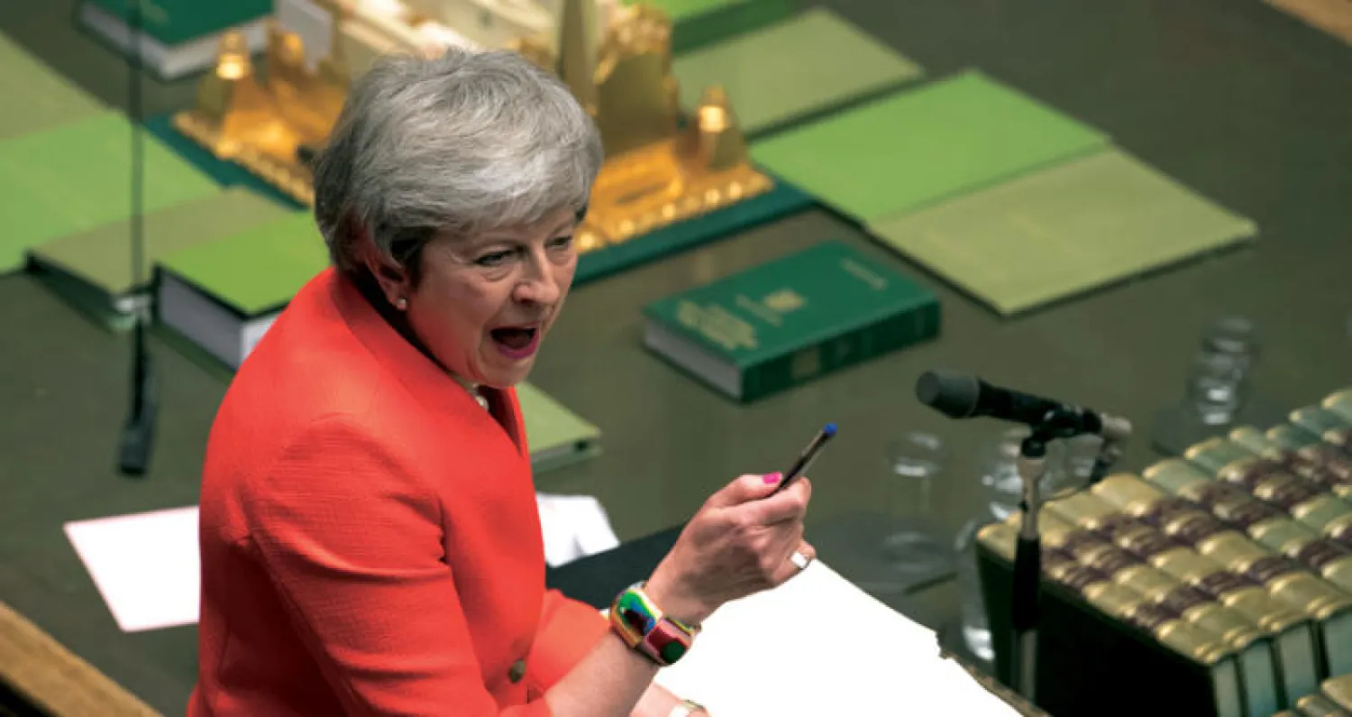 طالبت ماي البرلمان بالقيام بواجبه لكي تتمكن الدولة من المضي قدماً (أ.ب)