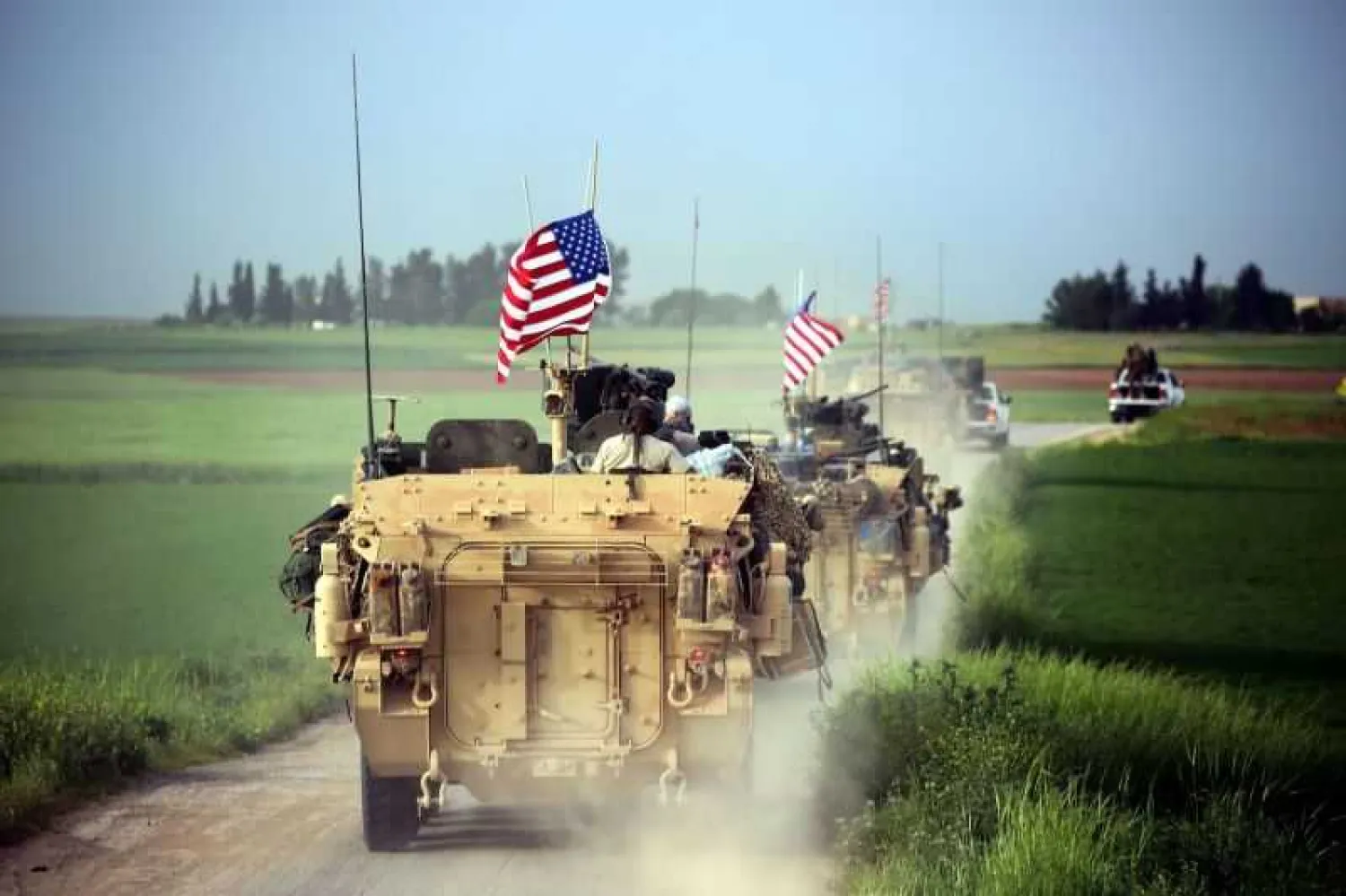 US forces, accompanied by the Kurdish People’s Protection Units (YPG), drive armored vehicles near the northern Syrian village of Darbasiyah on April 28, 2017. (File Photo: AFP/Getty Images)