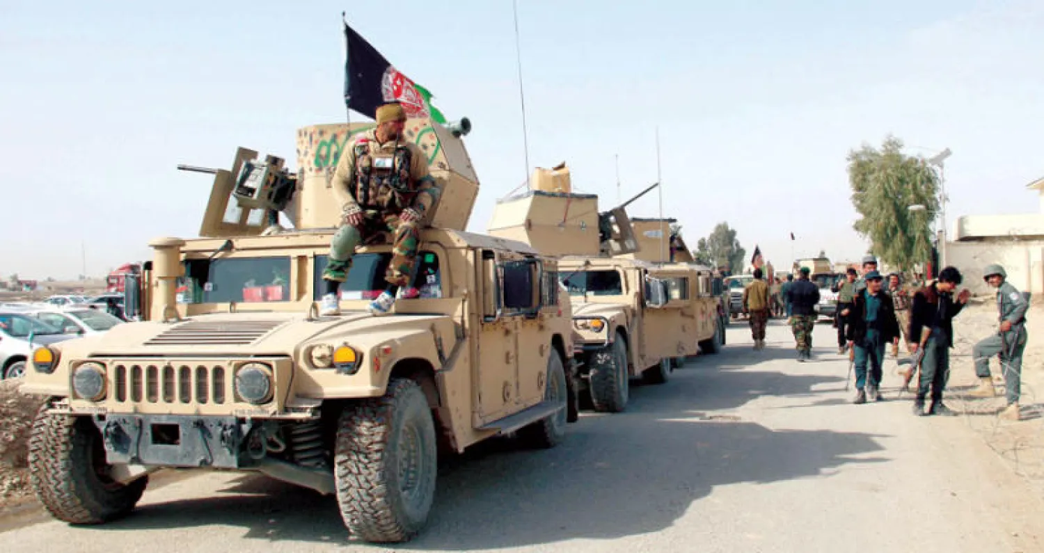 قوات أفغانية في عملية عسكرية ضد عناصر {طالبان} في محيط ولاية هلمند أول من أمس (إ.ب.أ)