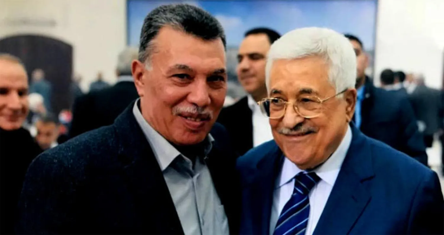 الرئيس الفلسطيني محمود عباس و أحمد حلس، عضو اللجنة المركزية لحركة «فتح».