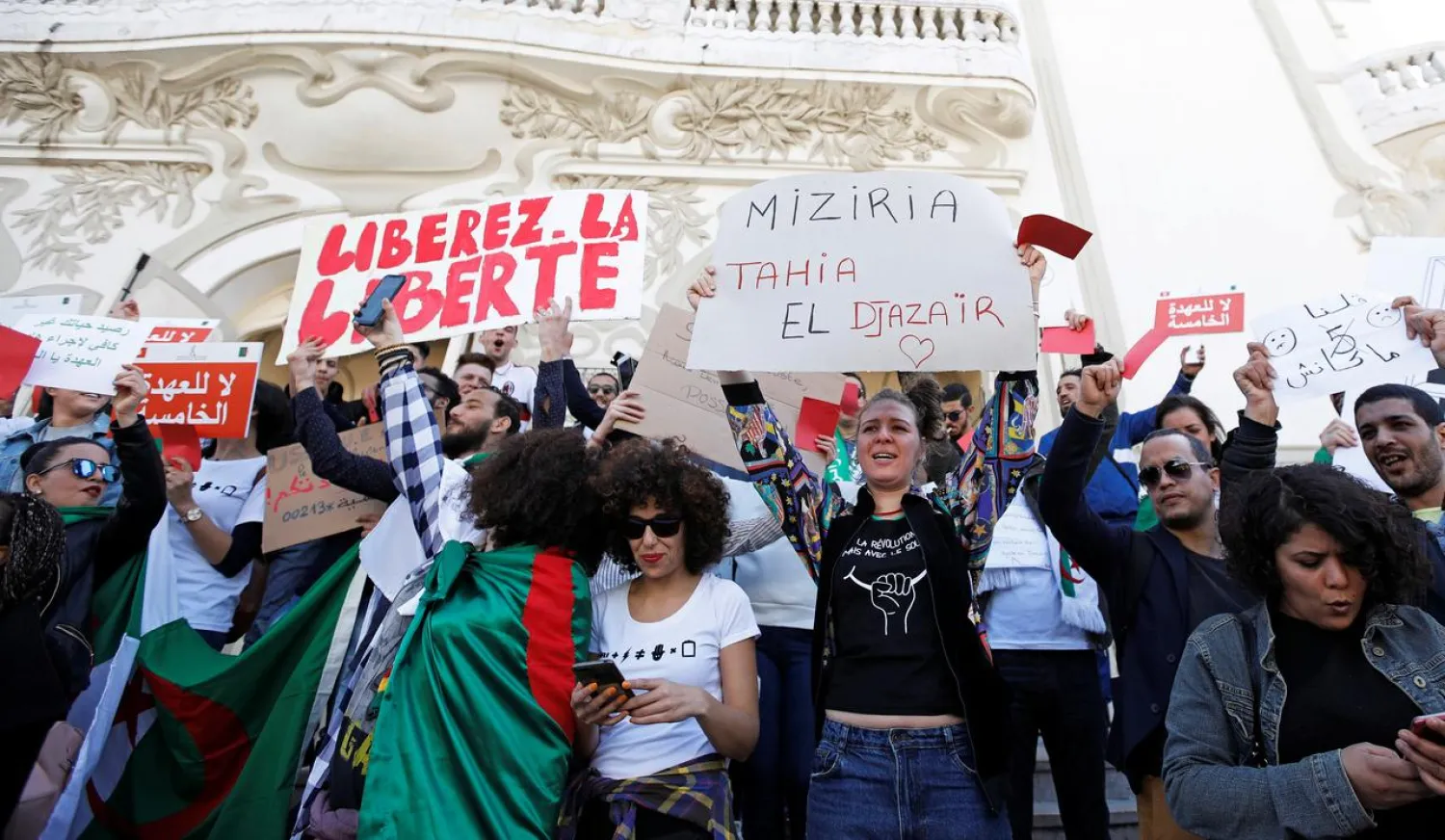 People take part in a protest against Algerian President Abdelaziz Bouteflika seeking a fifth term in a presidential election set for April 18, in Tunis, Tunisia, March 9, 2019. REUTERS/Zoubeir Souissi