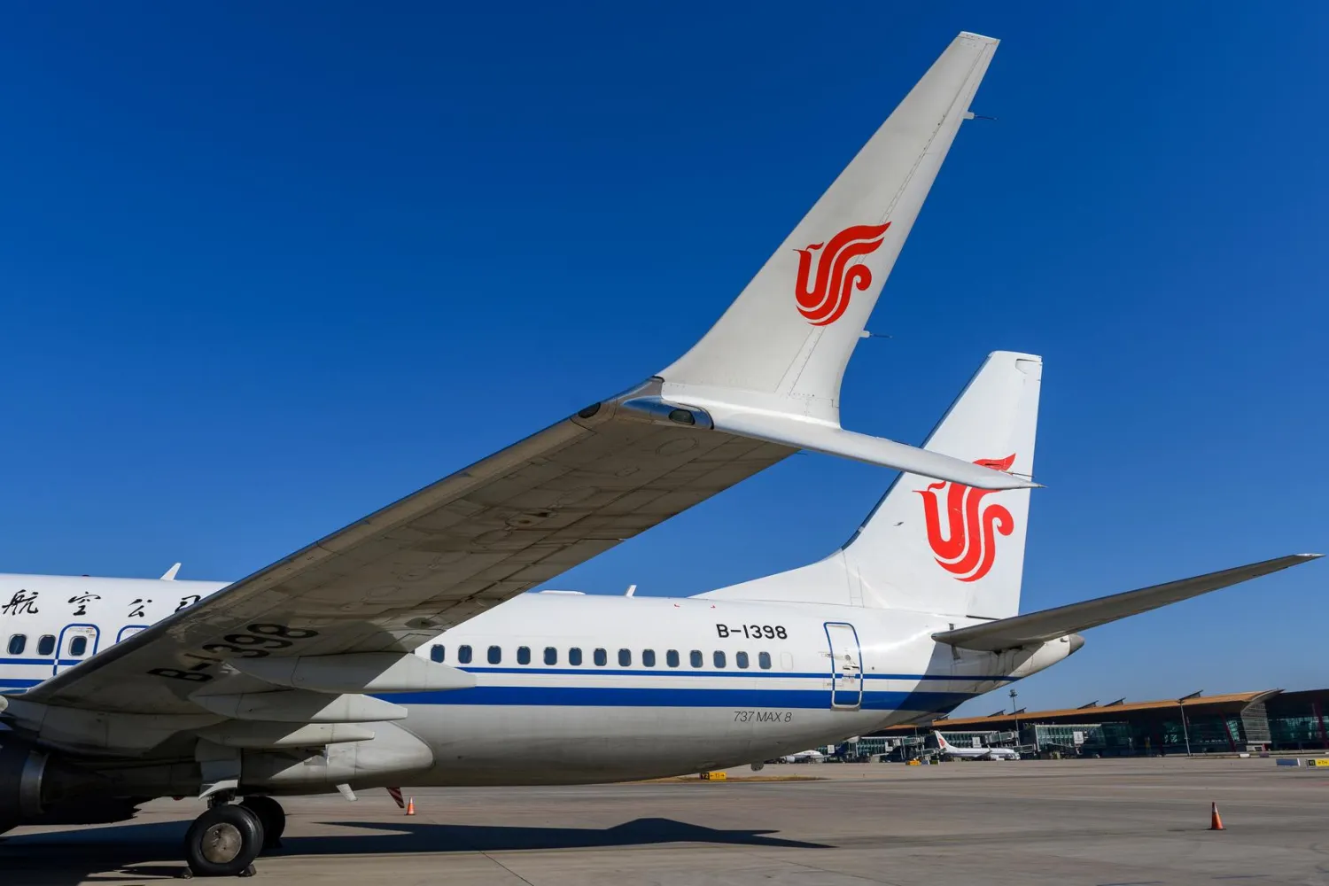 A Boeing 737 MAX 8 aircraft of Air China sits on the tarmac at an airport in Beijing, China March 11, 2019. REUTERS/Stringer
