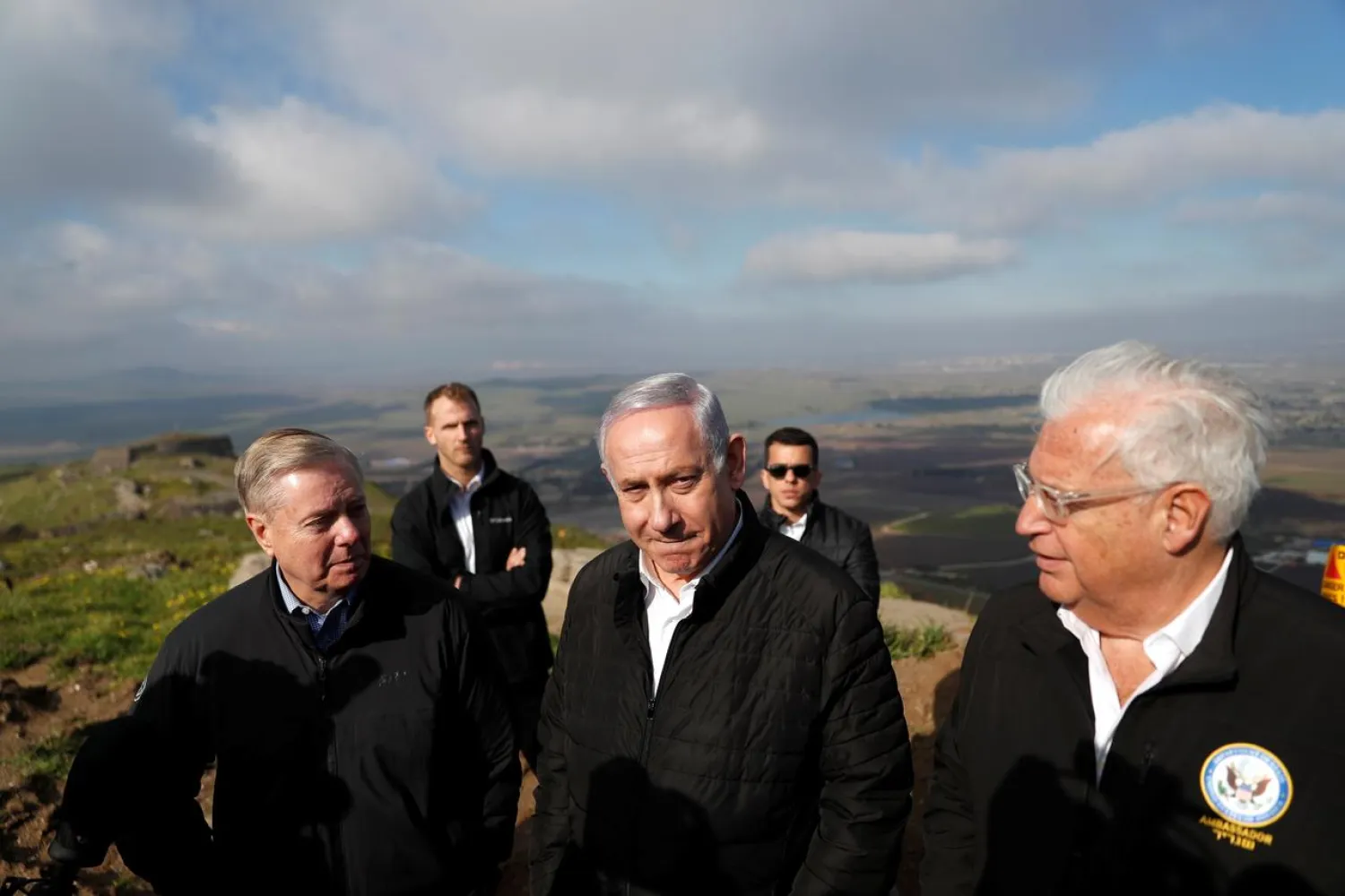 Israeli Prime Minister Benjamin Netanyahu, US Republican Senator Lindsey Graham and US Ambassador to Israel David Friedman visit the border line between Israel and Syria at the Israeli-occupied Golan Heights in March 11, 2019. REUTERS/Ronen Zvulun