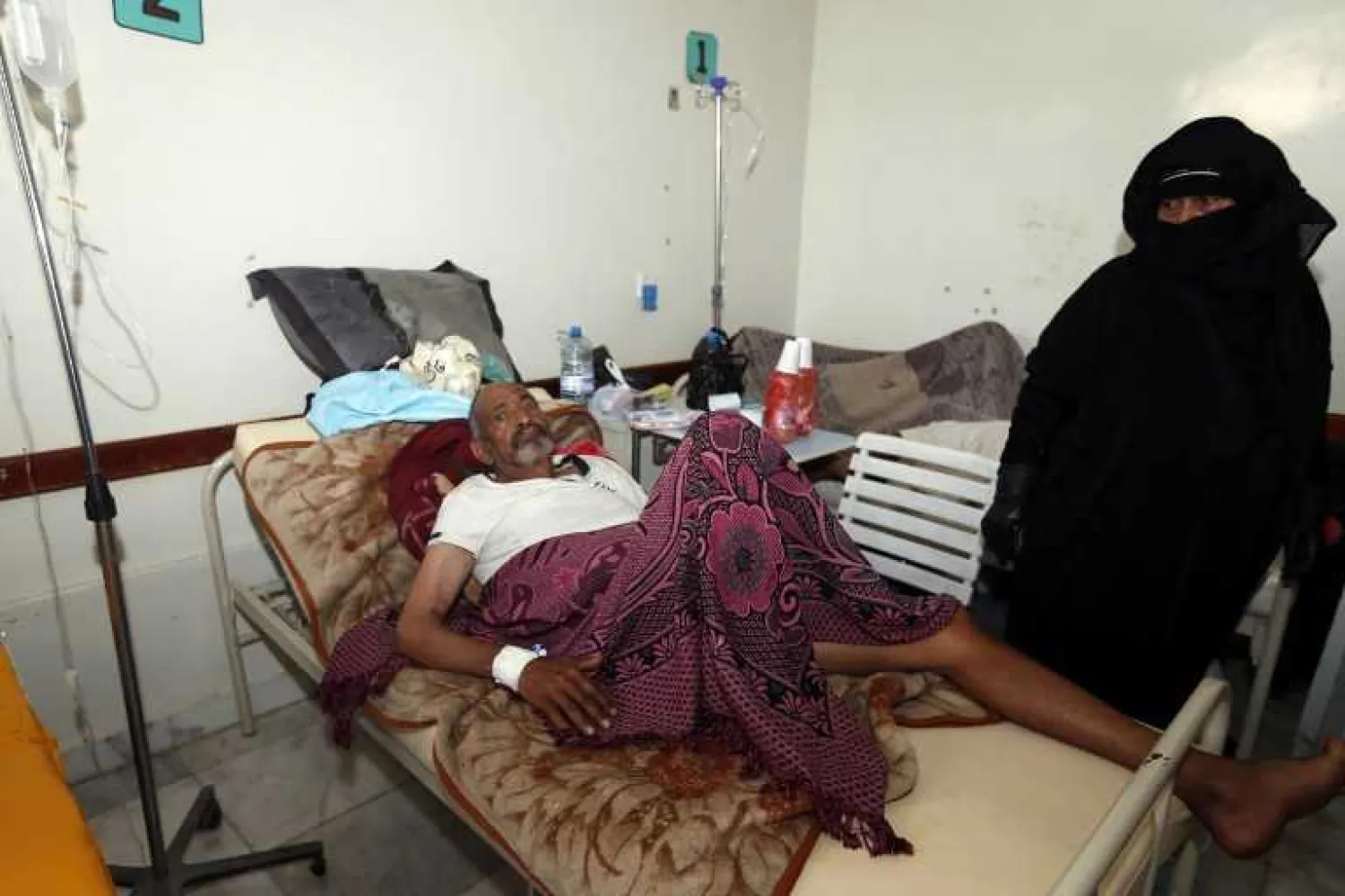  A Yemeni man suspected of being infected with cholera receives treatment at a hospital in Sanaa on May 12, 2017. (File Photo: AFP)