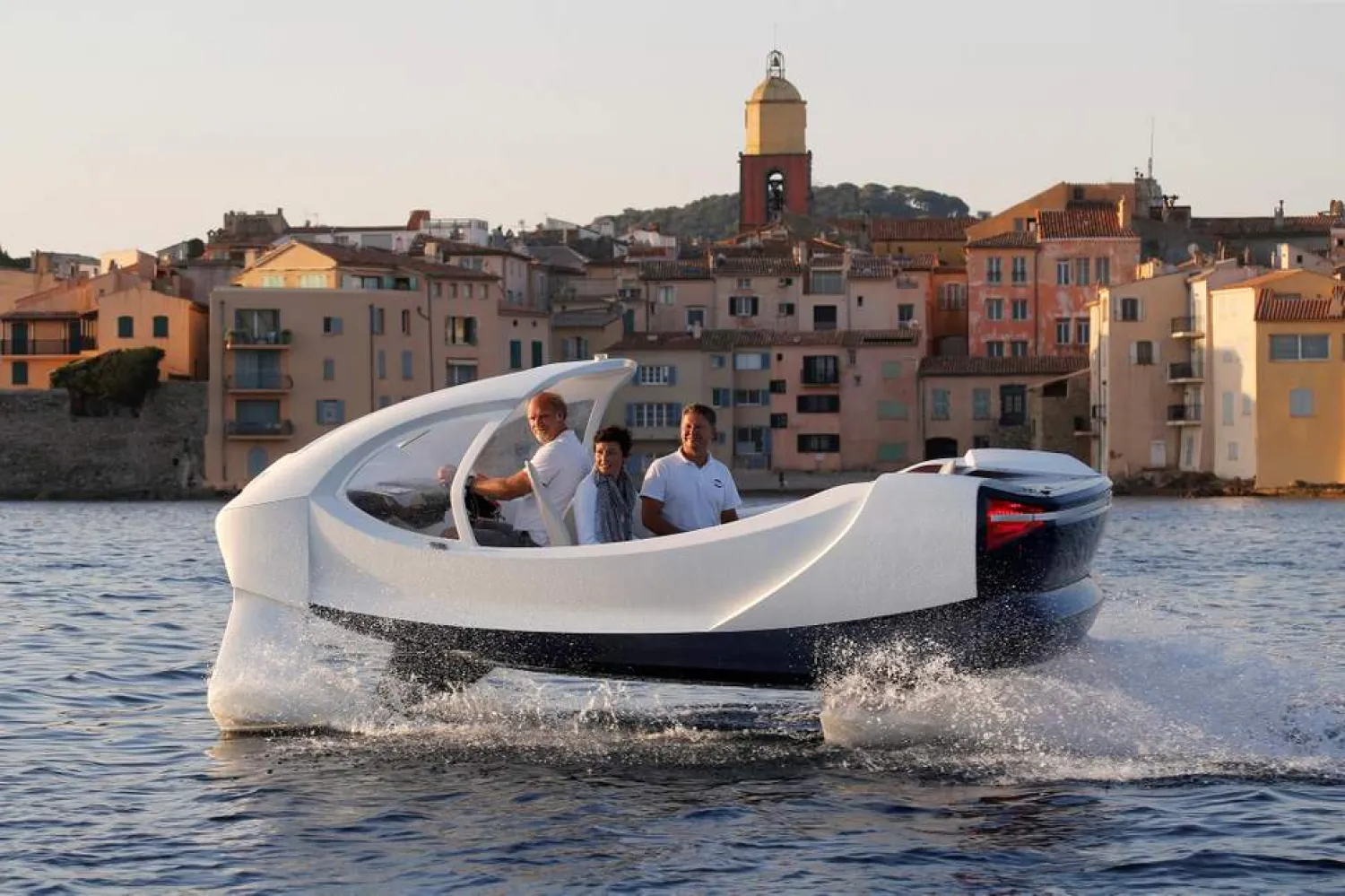 Founders of SeaBubbles, seen aboard a prototype of their water taxi in the harbor of Saint-Tropez, rue the red tape surrounding businesses in France. (Reuters)