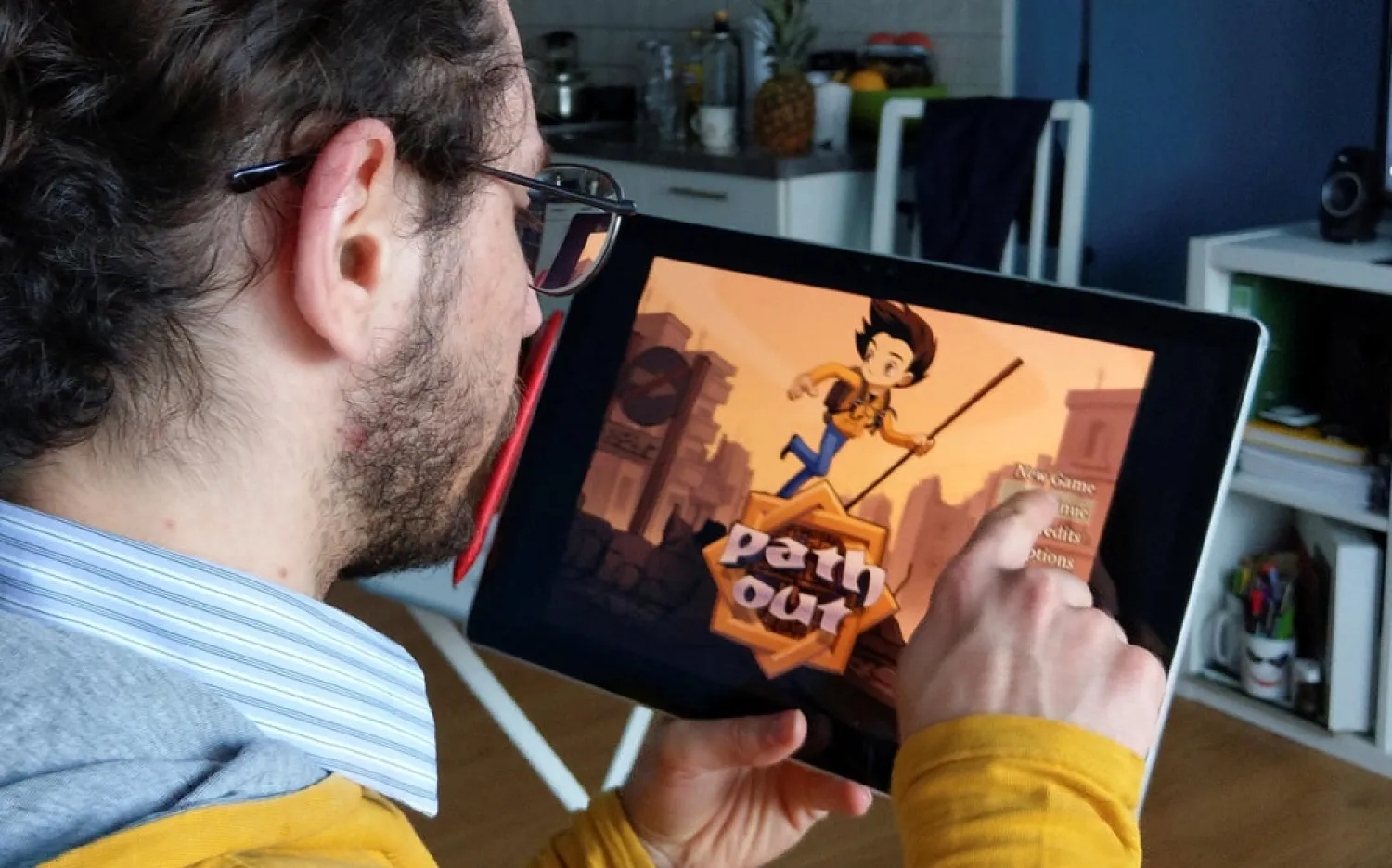 A Syrian refugee, Abdullah Adnan Karam plays computer game ‘Path Out’ in Salzburg, Austria March 19, 2019. (Reuters)