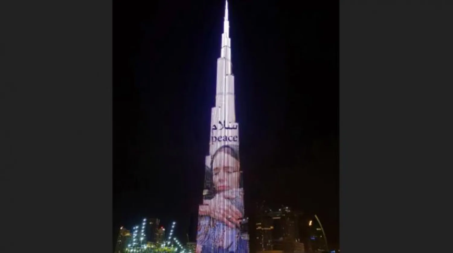 A handout image obtained from Dubai's Public Diplomacy Office on March 23, 2019 shows the Gulf emirate's Burj Khalifa tower lit the previous night with an image of New Zealand's Prime Minister Jacinda Ardern. DUBAI'S PUBLIC DIPLOMACY OFFICE / AFP