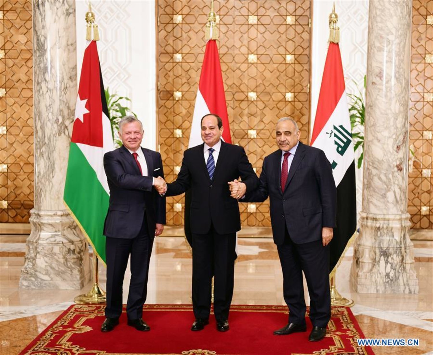 Egyptian President Abdel-Fattah al-Sisi (C) shakes hands with King Abdullah II of Jordan (L) and Iraqi Prime Minister Adel Abdul Mahdi in Cairo, Egypt, March 24, 2019. (Xinhua/MENA)