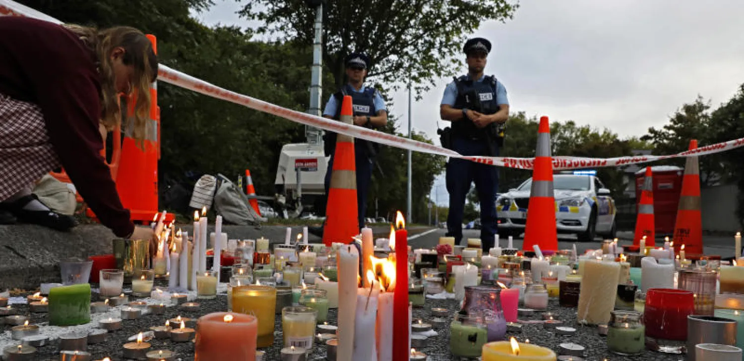 الشموع في وقفة لإحياء ذكرى ضحايا "مذبحة نيوزيلندا" (أ.ب)