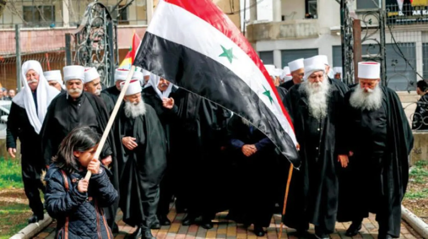 Syrian Druze protest in Golan against Washington's decision to recognize Israel's sovereignty over it (AFP)