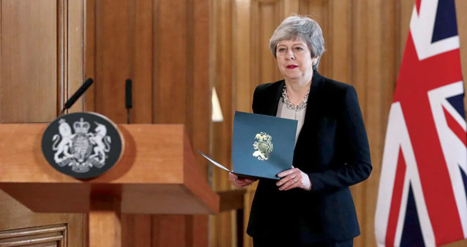 ماي خلال مؤتمر صحافي في لندن مساء أمس (رويترز)