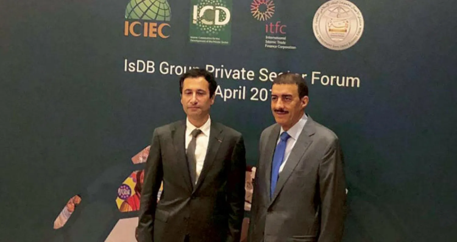 بندر حجار رئيس البنك الإسلامي للتنمية ومحمد بنشعبون وزير المالية والاقتصاد المغربي في انطلاق الاجتماعات السنوية للبنك في مراكش (الشرق الأوسط)