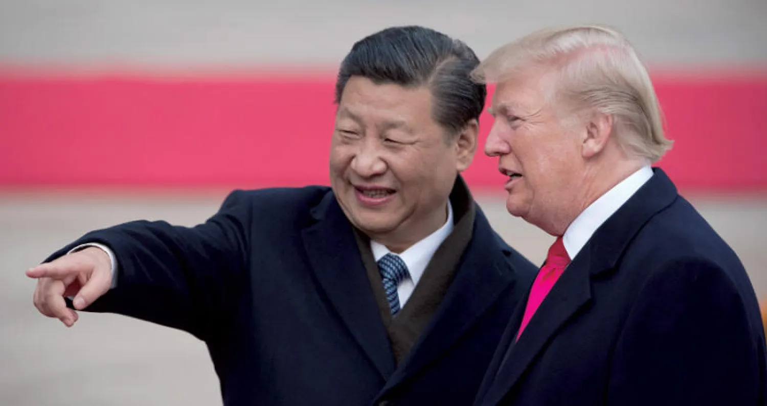 صورة أرشيفية للرئيس الأميركي دونالد ترمب والصيني شي جينبينغ في بكين نوفمبر 2017 (أ.ف.ب)
