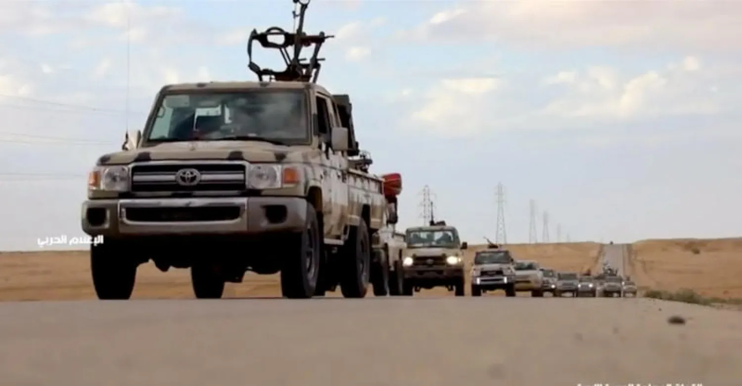 آليات عسكرية تابعة للجيش الوطني الليبي (رويترز)