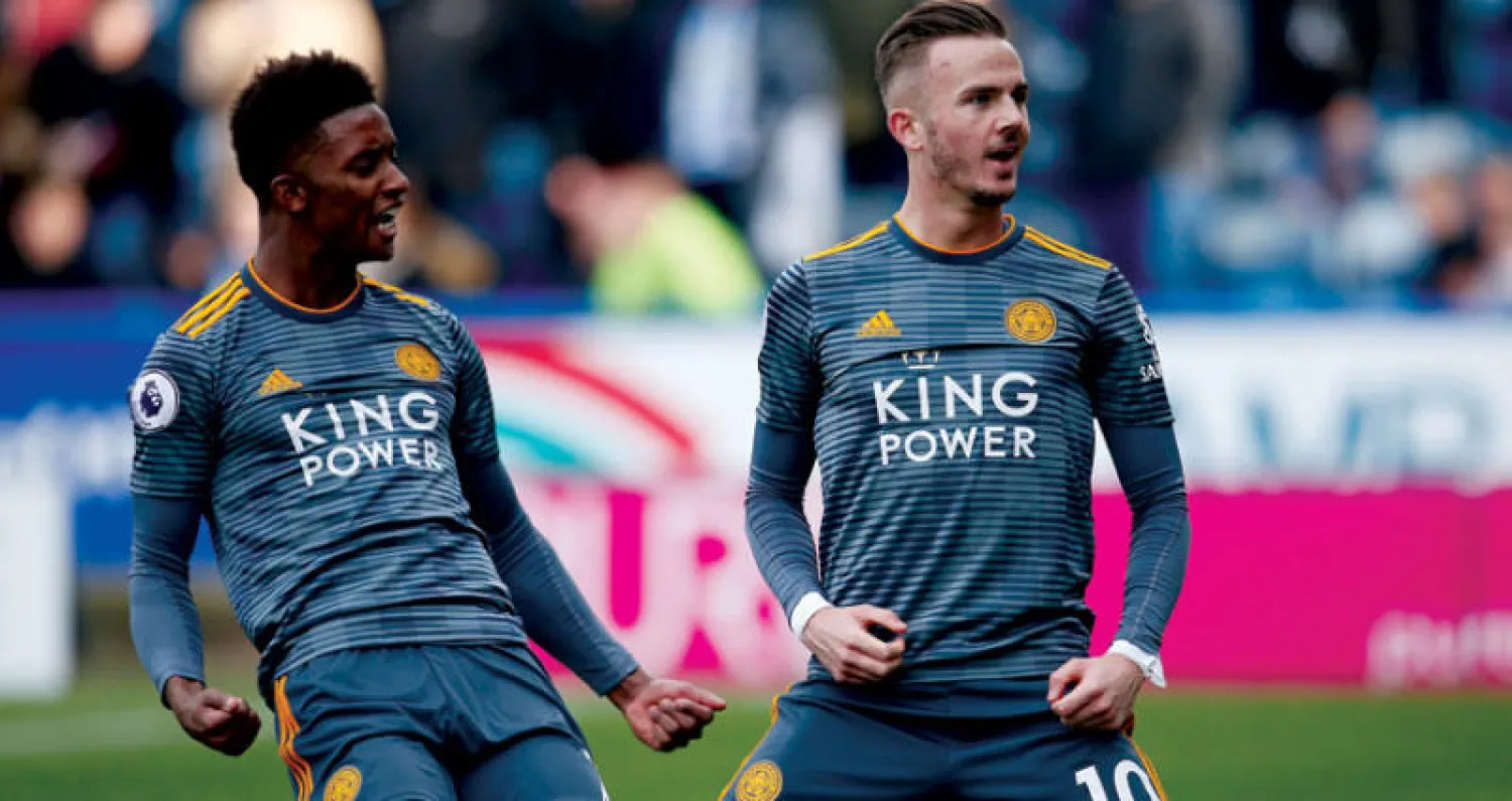 ماديسون بعد هدف ليستر الثالث والى يساره غراي   (رويترز)