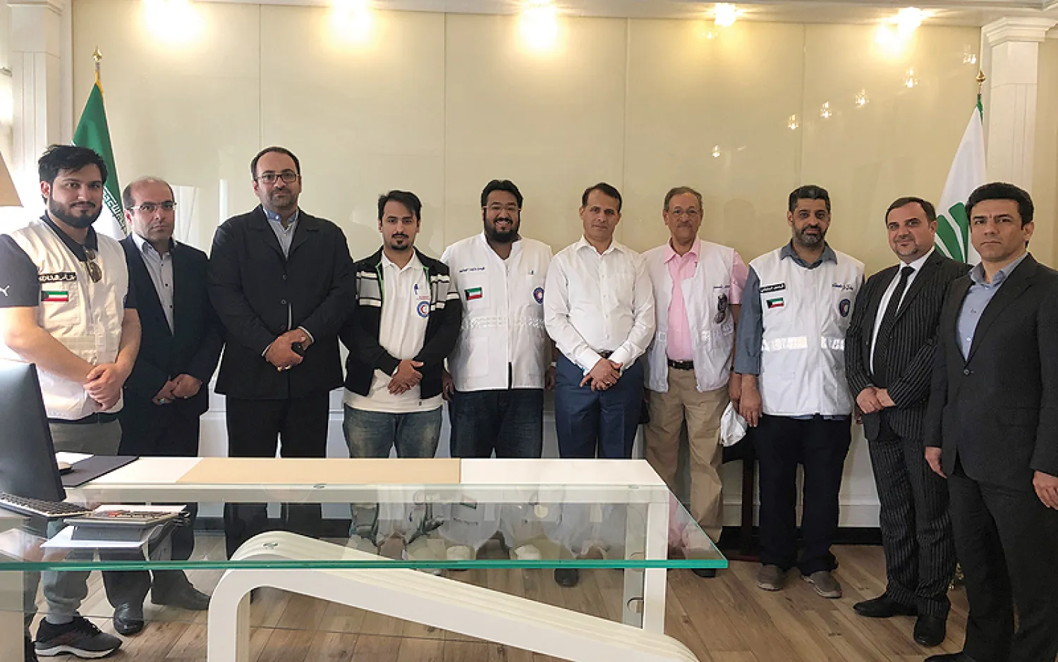 The Kuwait Red Crescent Society (KRCS) team visiting flood-stricken victims in Iran. — KUNA