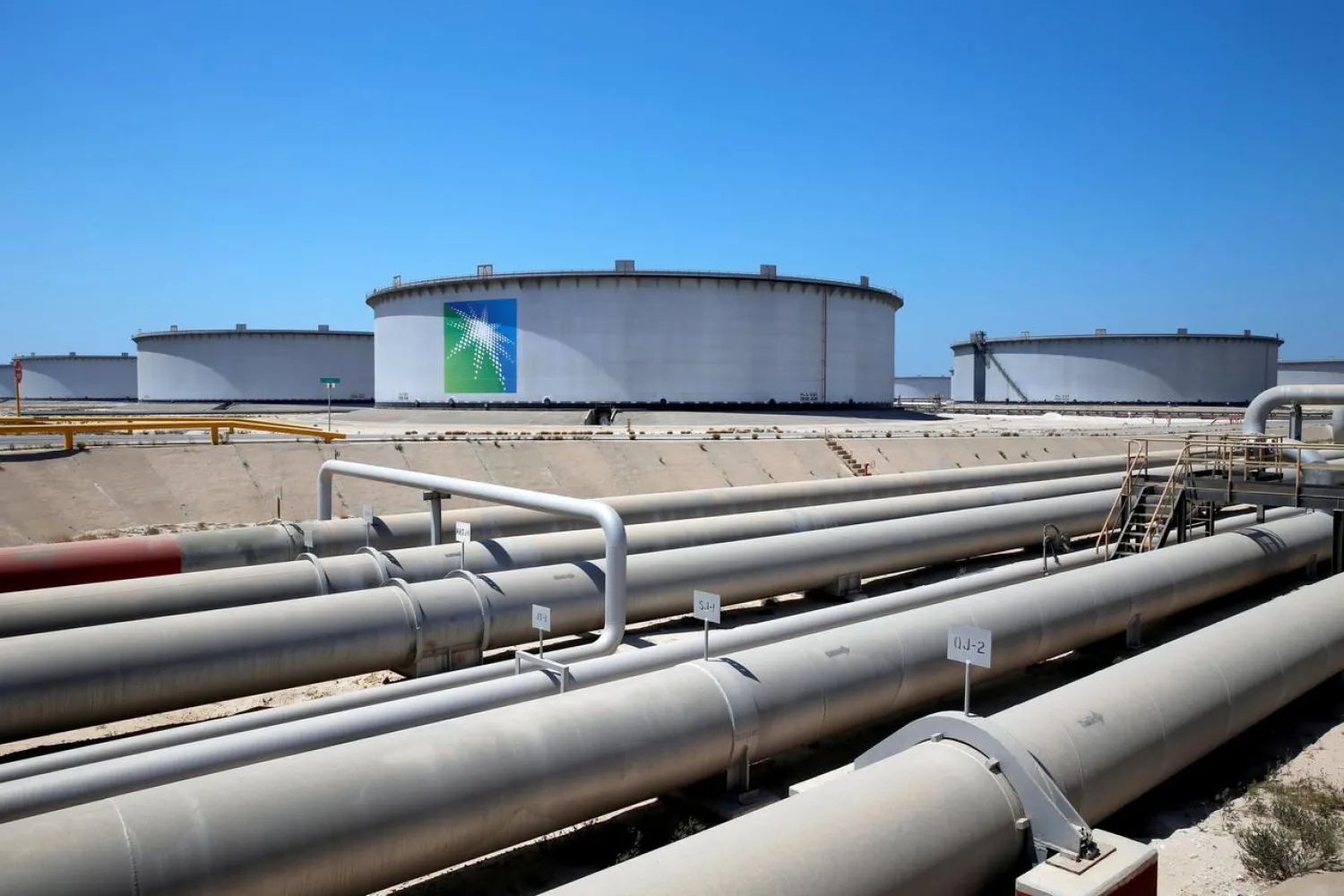 General view of Aramco tanks and oil pipe at Saudi Aramco's Ras Tanura oil refinery and oil terminal in Saudi Arabia May 21, 2018. (Reuters)