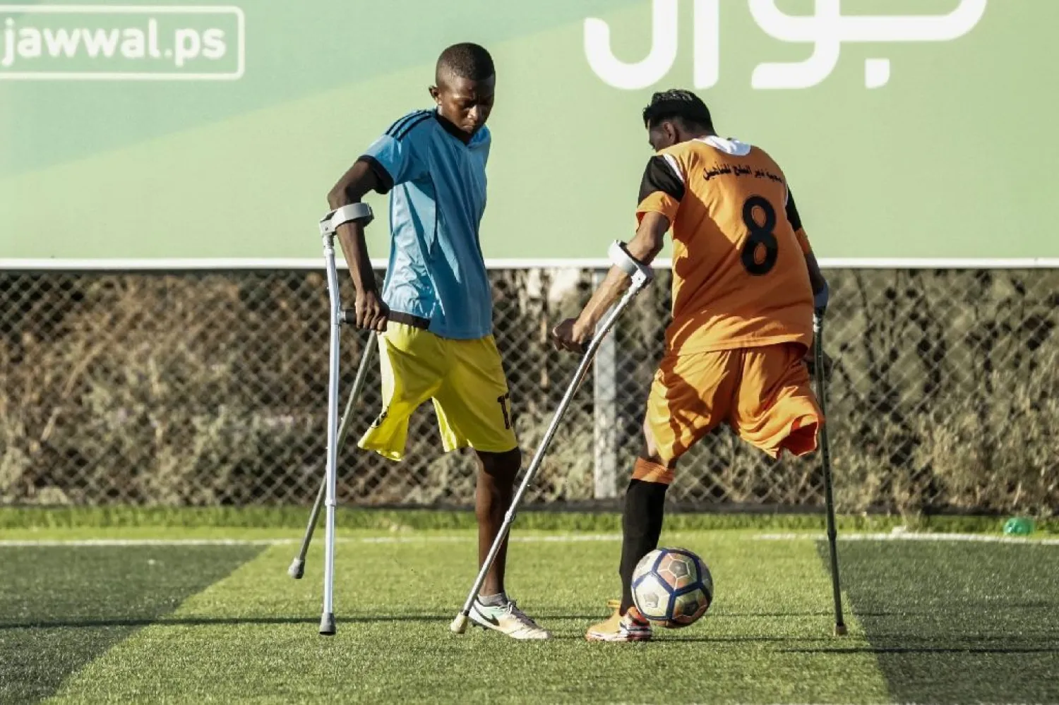 Palestinian amputee football players train at the municipal stadium in Gaza's Deir El-Balah on July 9, 2018. (AFP)