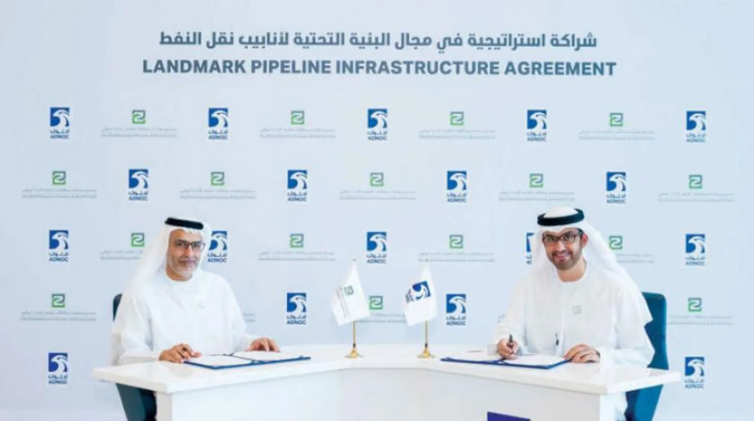 Sultan Al Jaber and Riyad Al Mubarak during the signing of the agreement. Asharq Al-Awsat