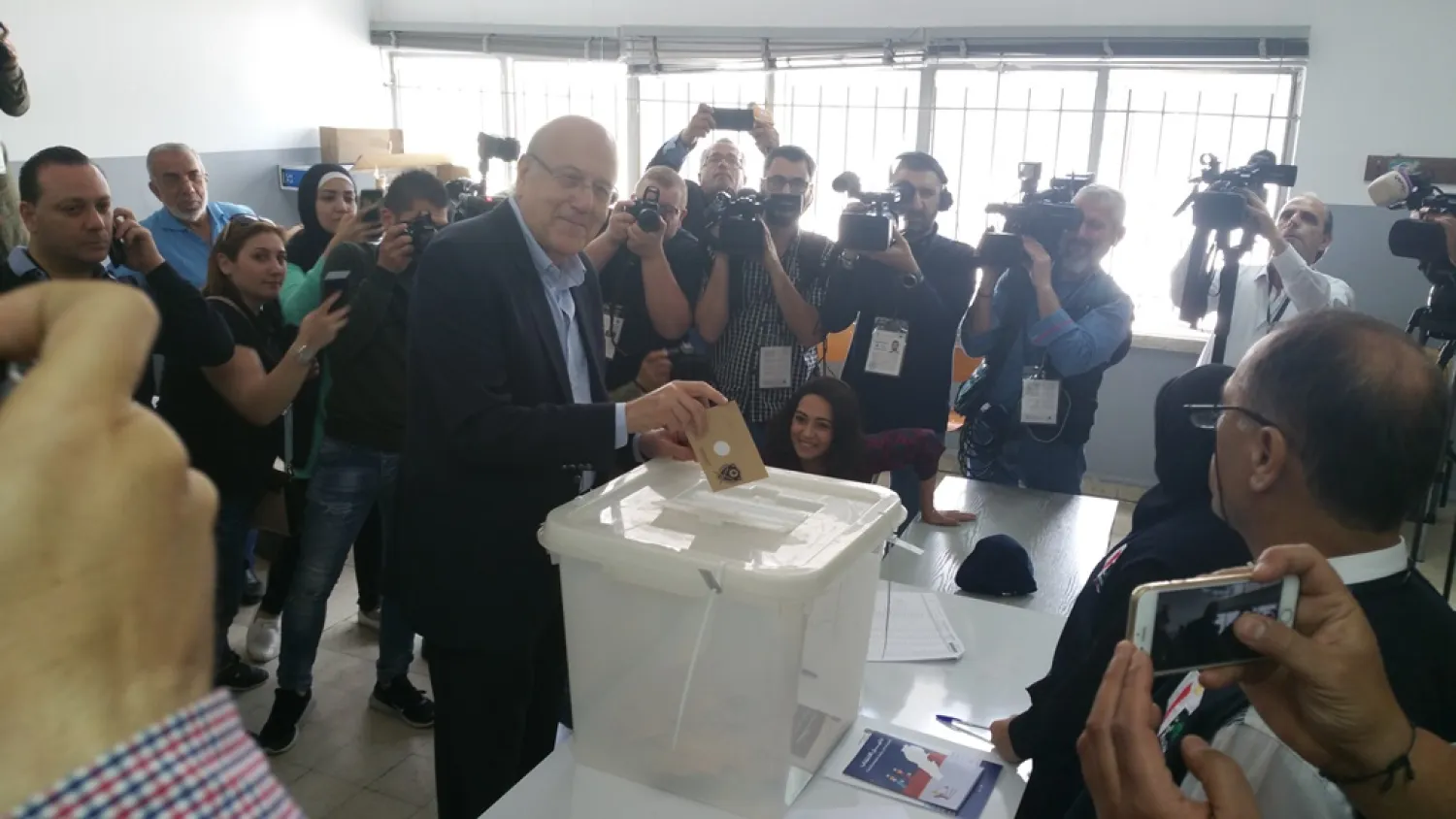 Former Prime Minister Najib Miqati votes in the Tripoli parliamentary by-elections on Sunday. (NNA)