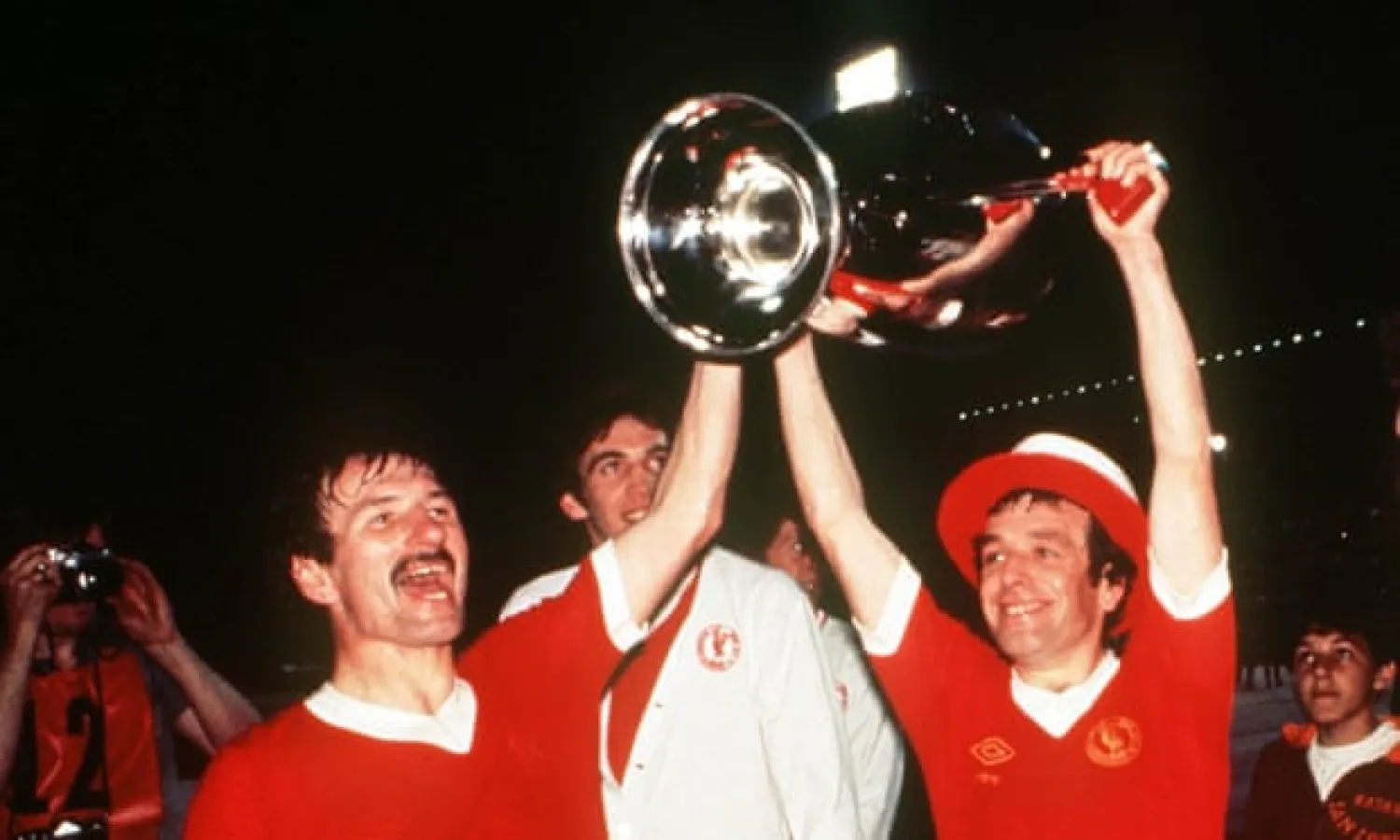  Tommy Smith (left) celebrates with Ian Callaghan after Liverpool beat Borussia Mönchengladbach in the 1977 European Cup final. Photograph: Colorsport/Rex/Shutterstock

