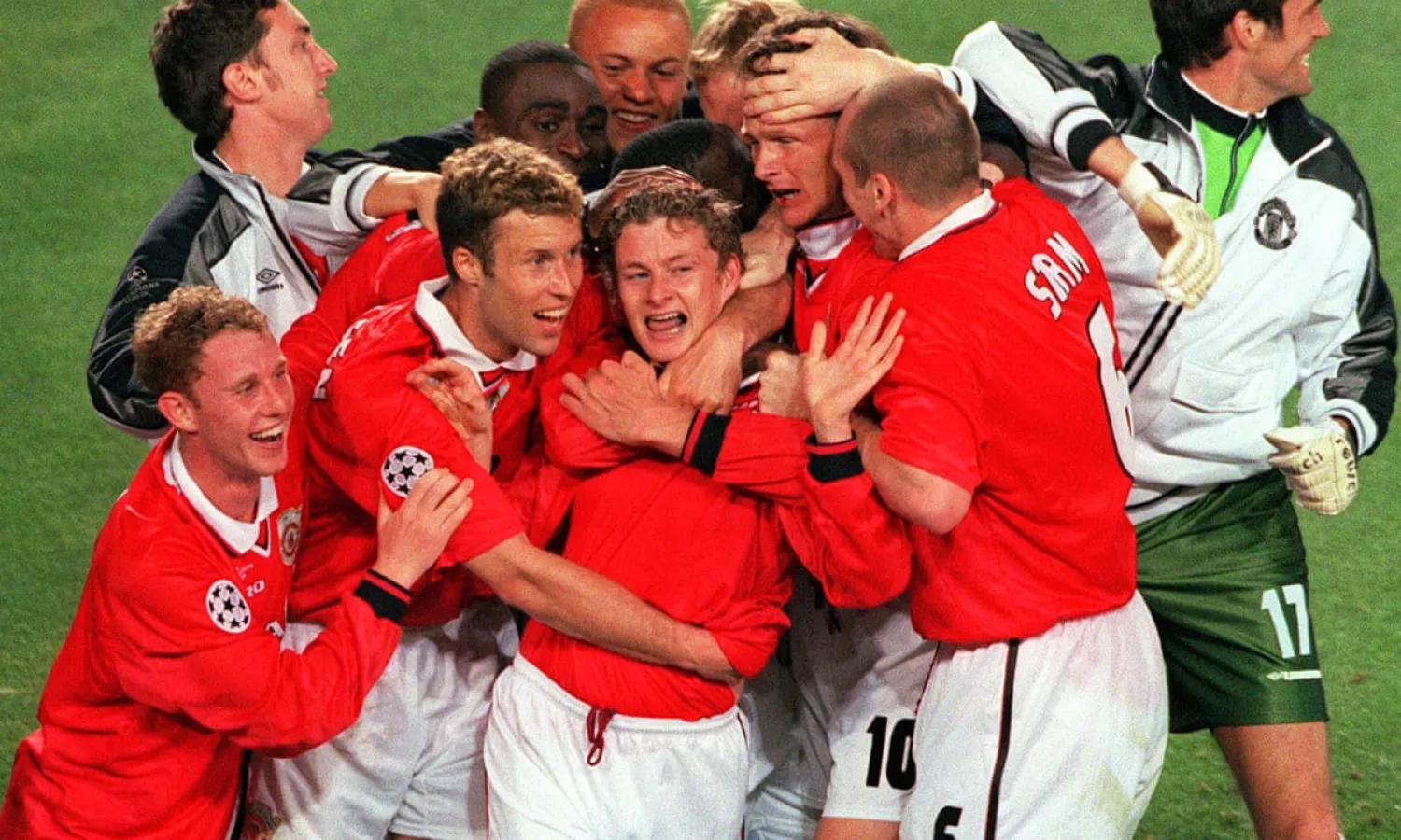 Ole Gunnar Solskjær is mobbed by his Manchester United teammates after coming off the bench to score a 93rd-minute winner in the 1999 Champions League final. Photograph: Colorsport/Rex/Shutterstock