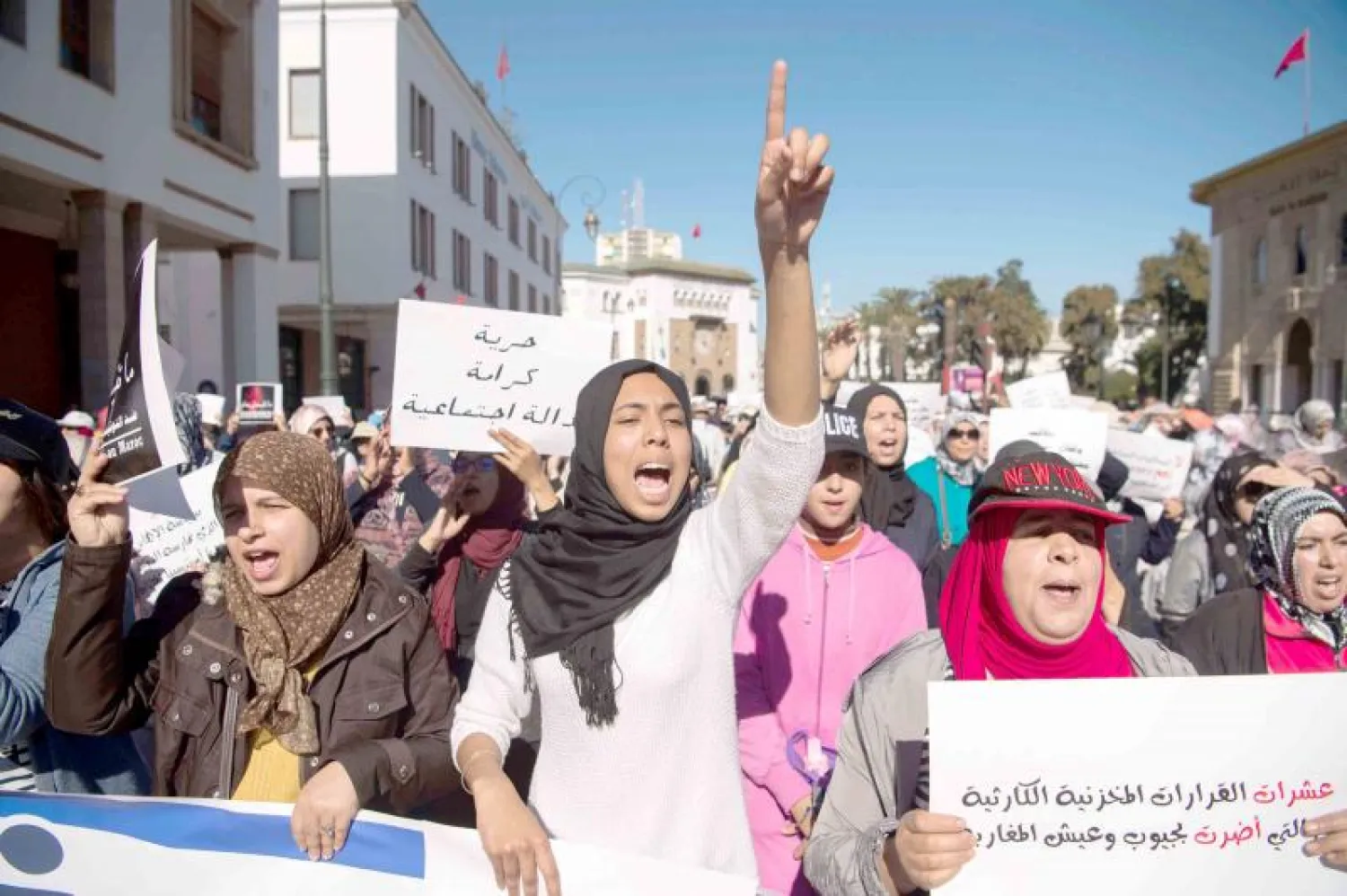 Moroccans chant slogans and hold up anti-government signs during a protest in Rabat. (File Photo: AFP)

