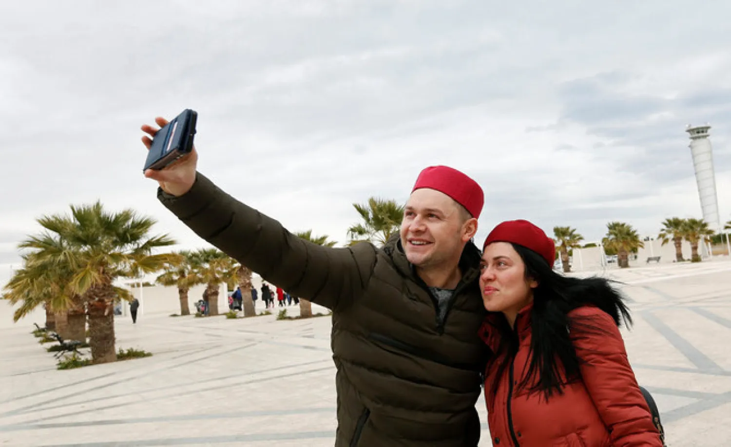 British tourists take a selfie after arriving in Tunisia. (Reuters)