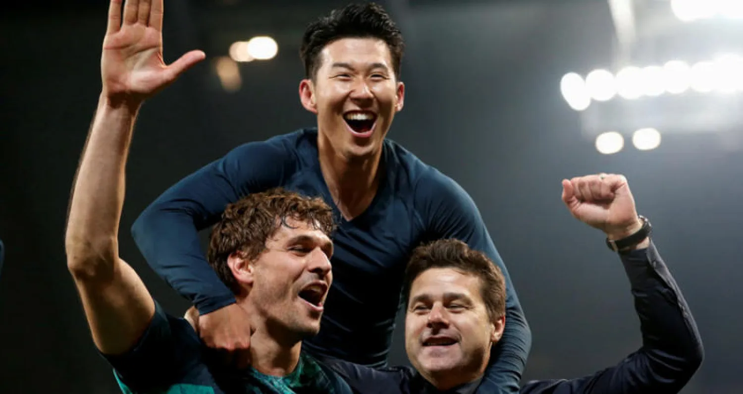 بوكتينيو يشارك سون وليورنتي الاحتفال بالتأهل لنصف نهائي دوري الأبطال (رويترز)