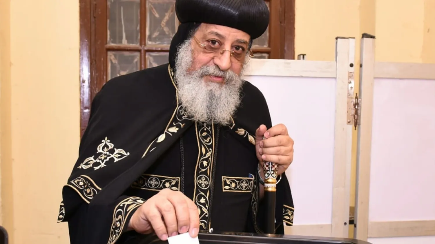 Egypt's Coptic Orthodox Pope Tawadros II casting his ballot paper during the vote on a constitutional reform in Cairo. (EPA)