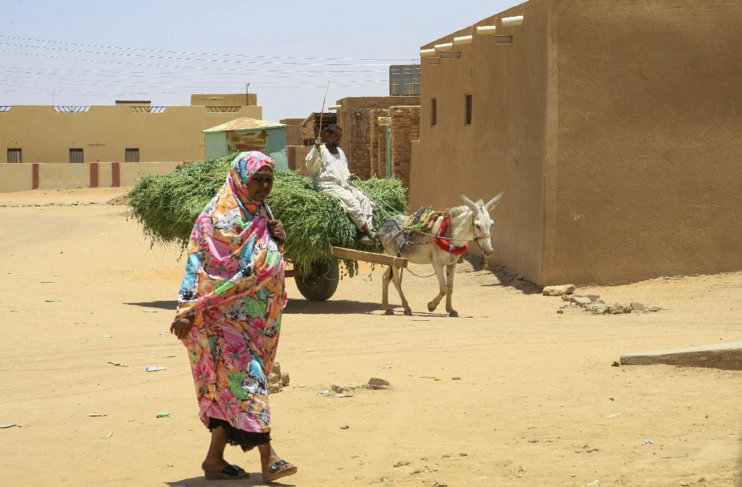 In the dusty streets of deposed Sudanese president Omar al-Bashir's hometown of Hosh Bannaga residents say it was time for the veteran leader to go | AFP