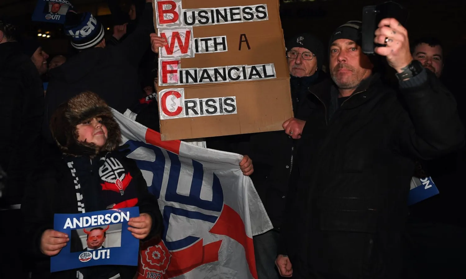 Bolton fans protest against the running of the club by Ken Anderson before January’s home game against West Bromwich Albion. Their side will be relegated on Friday if Wigan win. Photograph: Gareth Copley/Getty Images