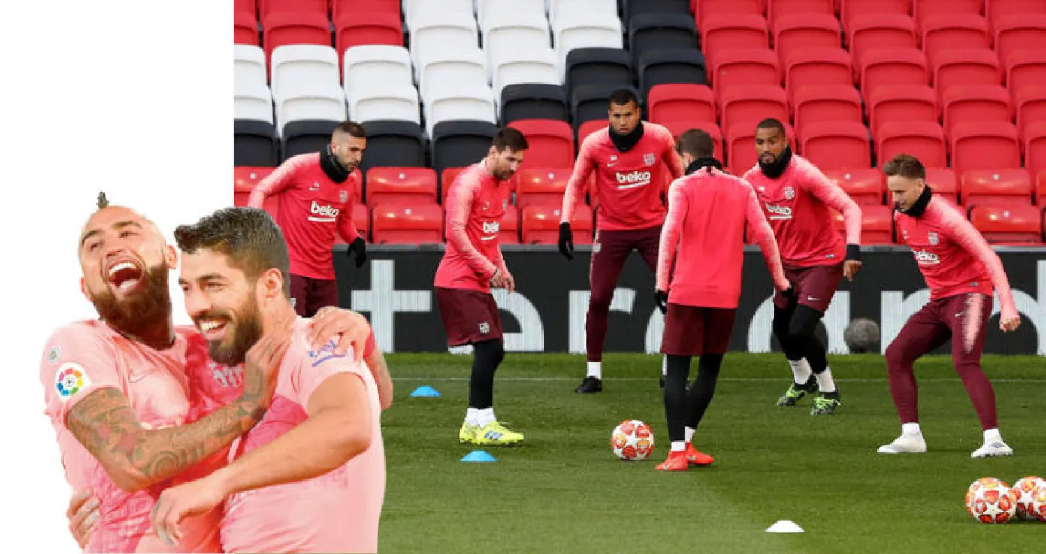 لاعبو برشلونة وأمل في إعادة كتابة التاريخ (إ.ب.أ)  -  سواريز مع أرتورو بعد هدفه في المرحلة السابقة (أ.ف.ب)