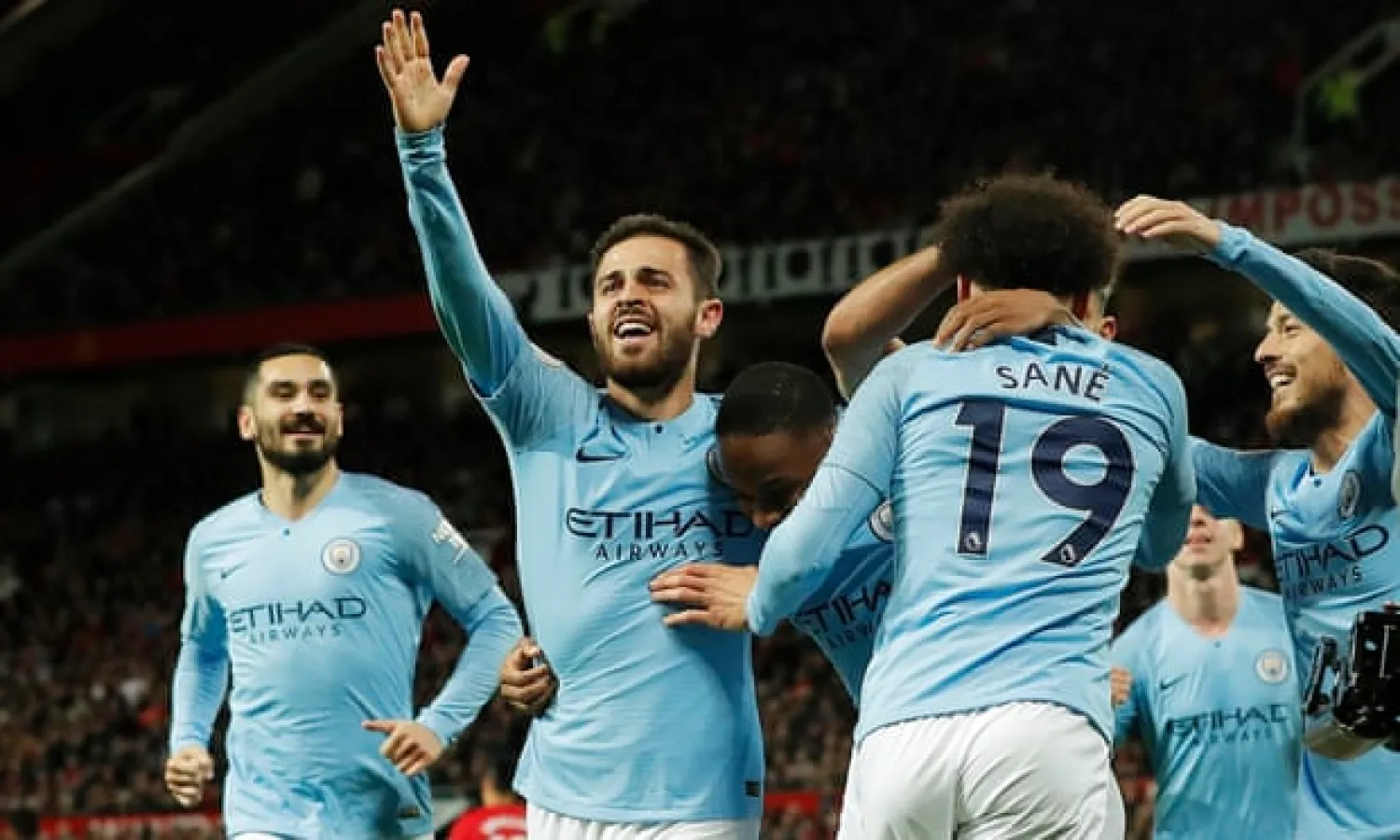  Manchester City players celebrate during their derby win over United. Photograph: Tom Jenkins/The Guardian
