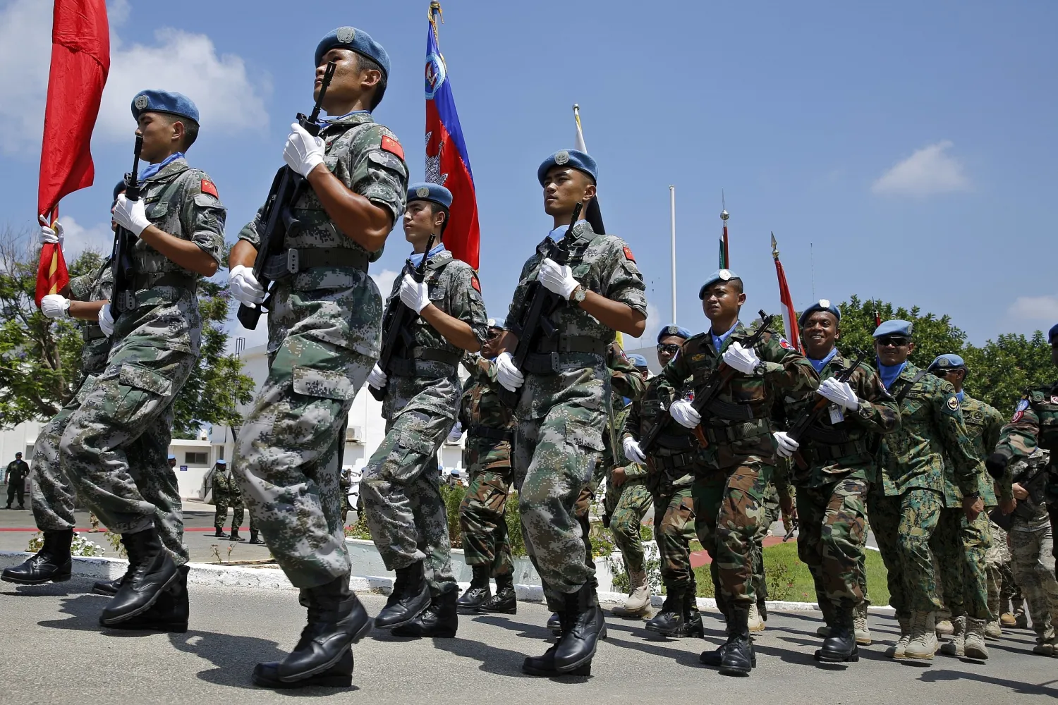  UN peacekeepers parade during a ceremony to mark the transfer of authority between the outgoing and the newly appointed head of the mission at the UNIFIL headquarters in the southern Lebanese town of Naqoura, Lebanon, Aug. 7, 2018. (AP/Bilal Hussein)
