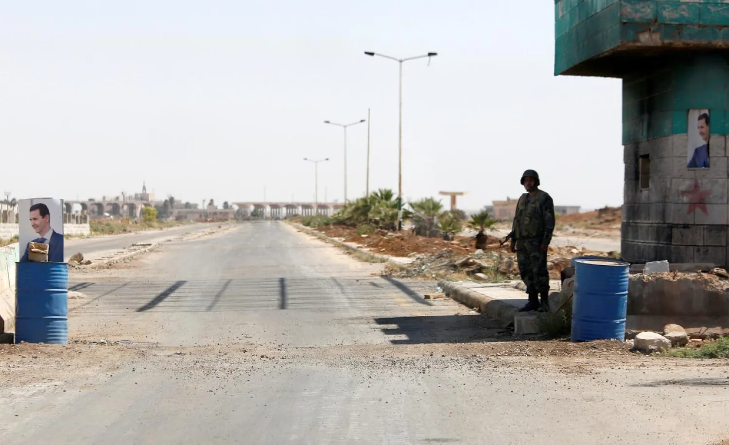 A Syrian soldier stands guard at the Nasib border crossing with Jordan in Daraa, Syria July 7, 2018. (Reuters)