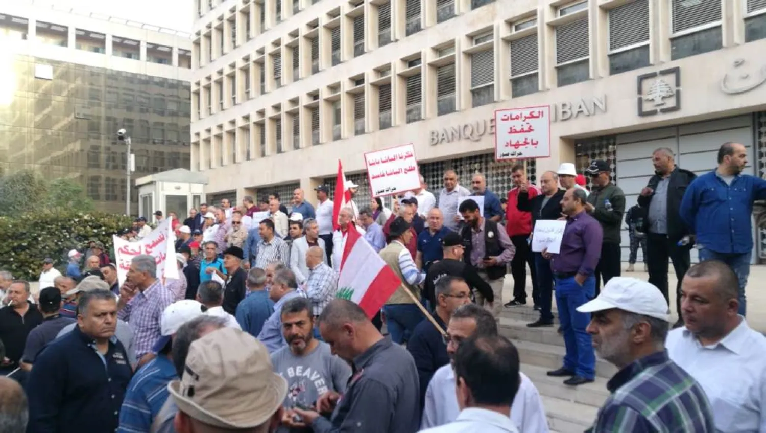 Retired military officers block all roads leading to the Lebanese Central Bank in Beirut on Tuesday. (NNA)