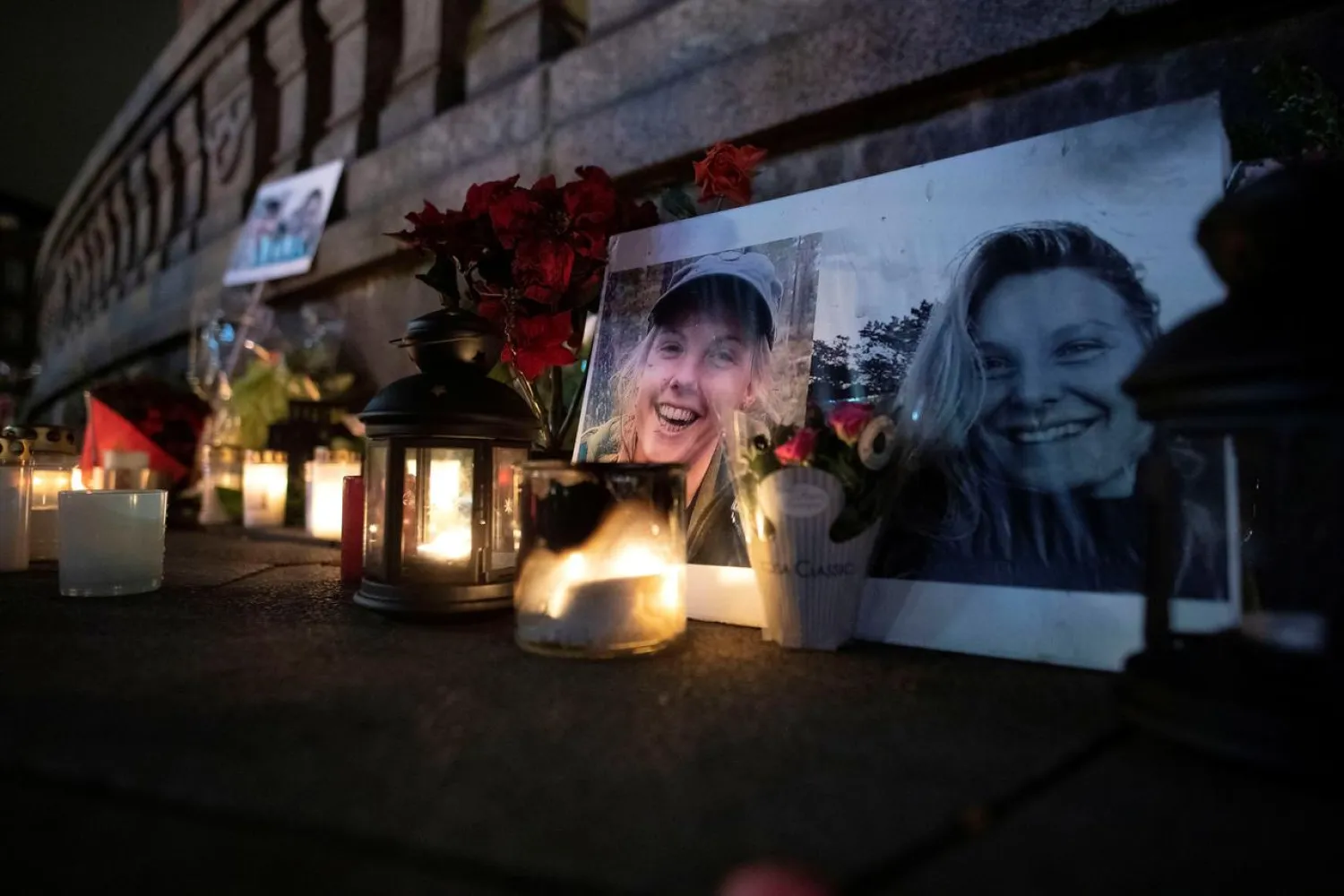 Flowers and candles in memory of Louisa Vesterager Jespersen and Maren Ueland are seen at the Town Hall Square in Copenhagen, Denmark December 28, 2018. (Reuters)
